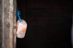 Himalayan pink salt block hanging from stable door